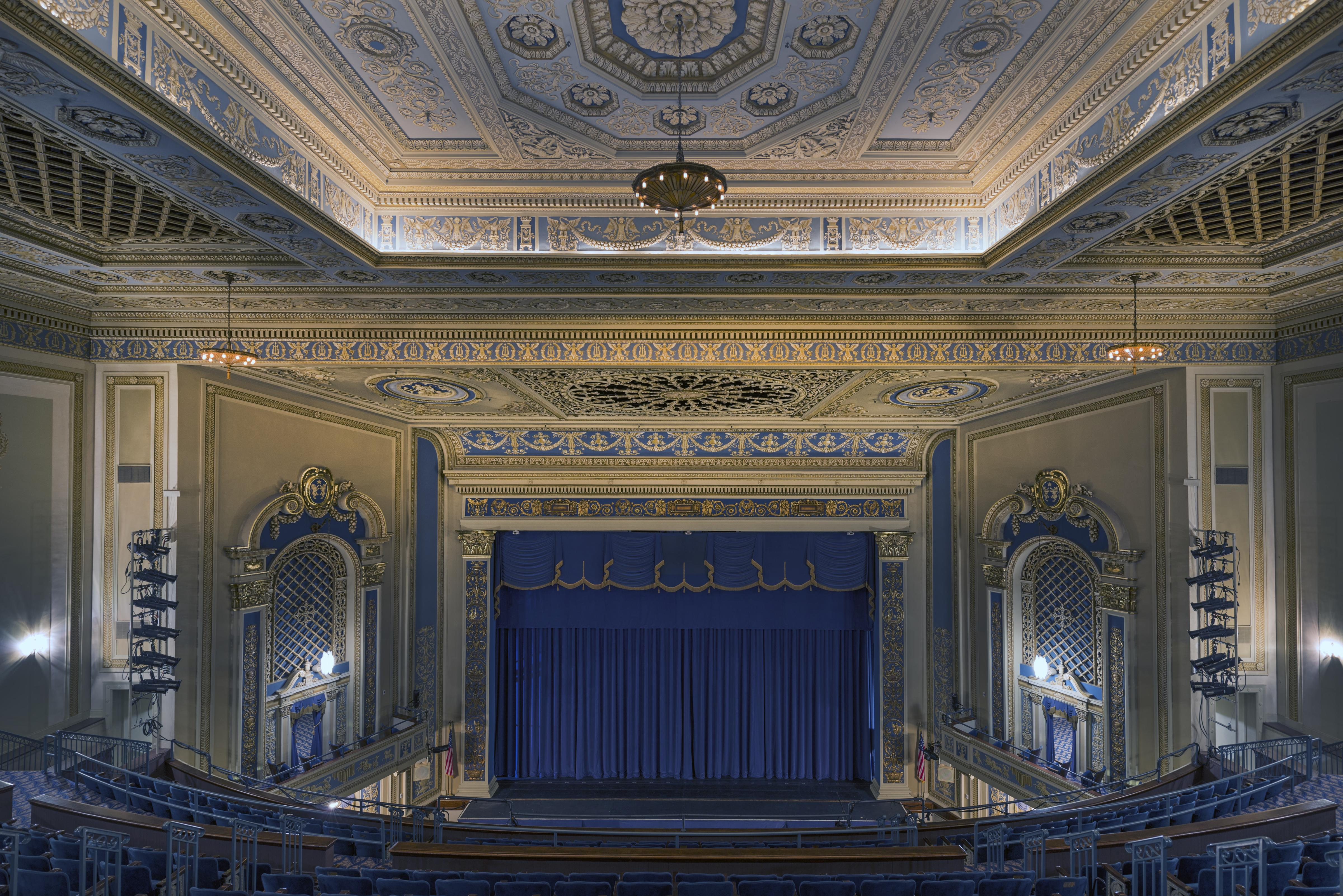Gilded proscenium and stage of the Perot Theatre